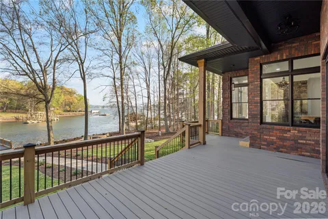 a view of a brick house with a large window