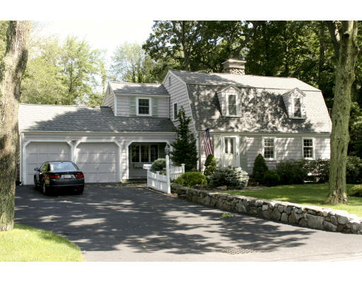 15 Lockeland Road Winchester, MA 01890 - Photo 1 of 24 a front view of a house with a yard
