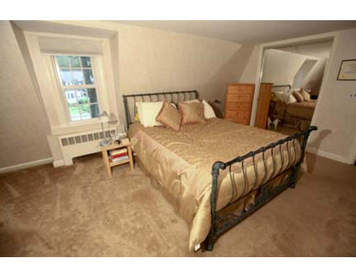 15 Lockeland Road Winchester, MA 01890 - Photo 17 of 24 a bedroom with a bed and window