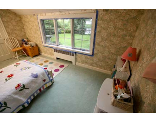 15 Lockeland Road Winchester, MA 01890 - Photo 20 of 24 a bedroom with a bed and a window