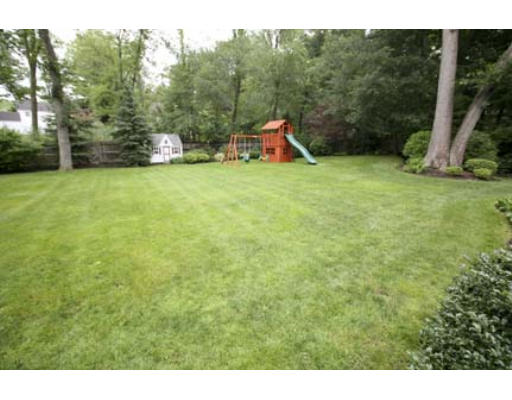 15 Lockeland Road Winchester, MA 01890 - Photo 23 of 24 a view of a field with trees in the background