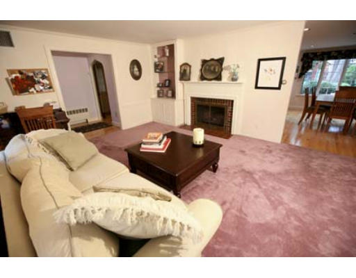 15 Lockeland Road Winchester, MA 01890 - Photo 6 of 24 a living room with furniture and a fireplace