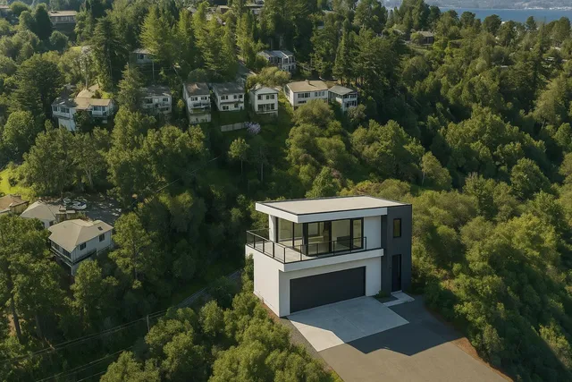 a view of house with a yard from balcony