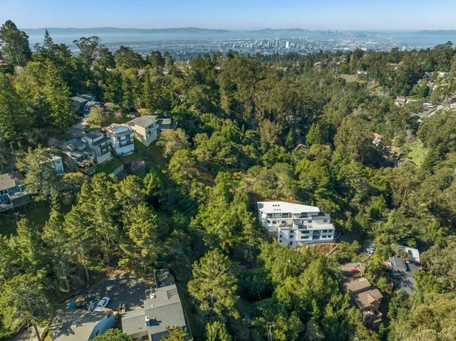 an aerial view of a city with lots of residential buildings