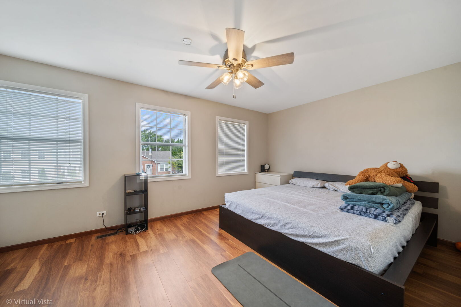 1402 Walnut Circle Carol Stream, IL 60188 - Photo 11 of 26 a living room with hard wood floors and a window