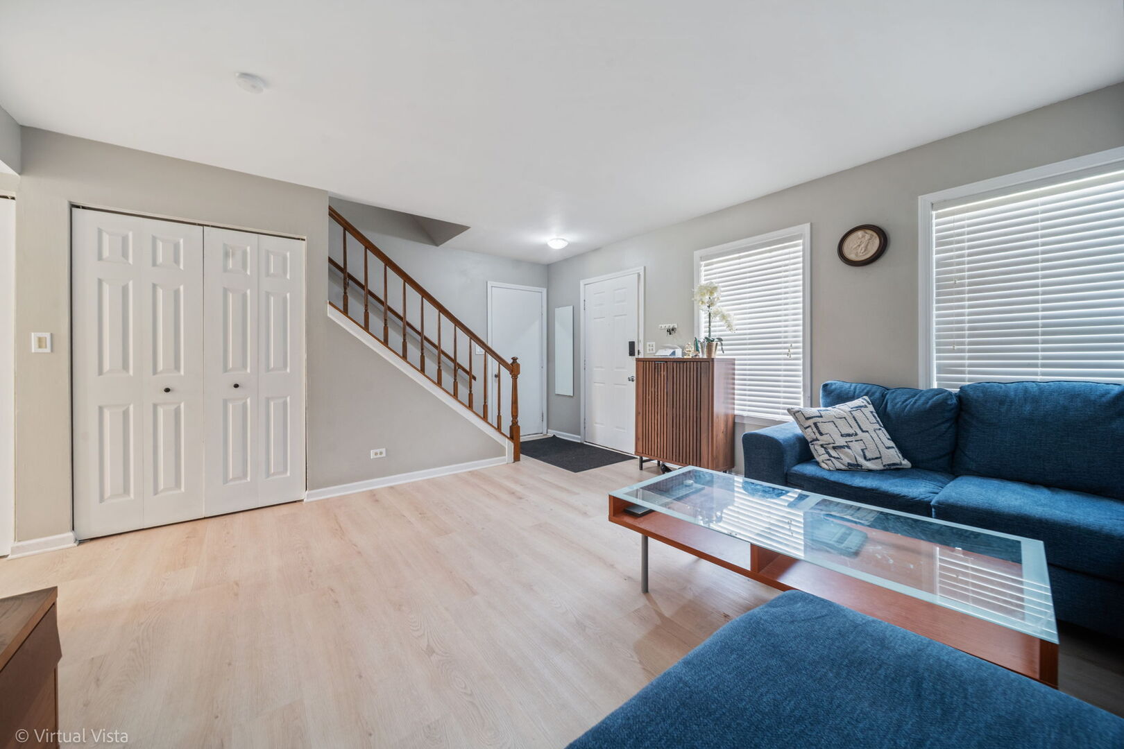 1402 Walnut Circle Carol Stream, IL 60188 - Photo 5 of 26 a living room with furniture and a wooden floor