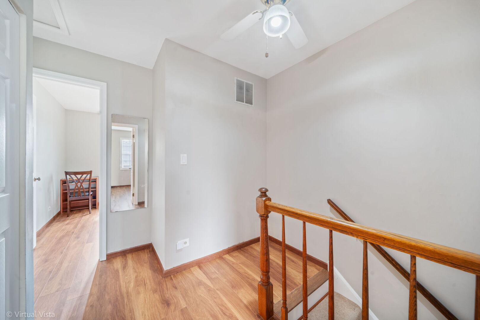 1402 Walnut Circle Carol Stream, IL 60188 - Photo 10 of 26 a view of hallway with wooden floor