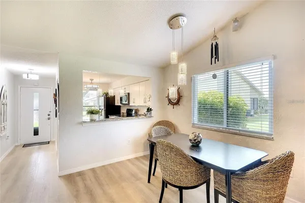 a workspace with furniture and window