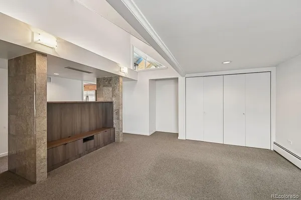 a bed room with a bed and a couch