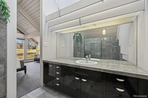 a view of an empty room with stairs