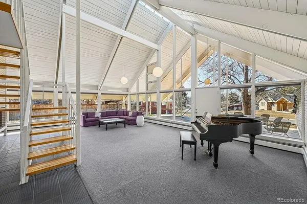 a view of a couch and table in a room