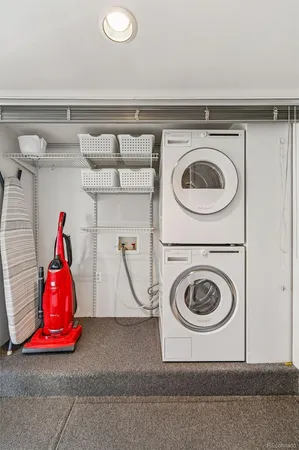 a view of a house with a small yard and sitting area