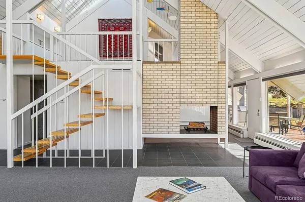 a view of a balcony with furniture