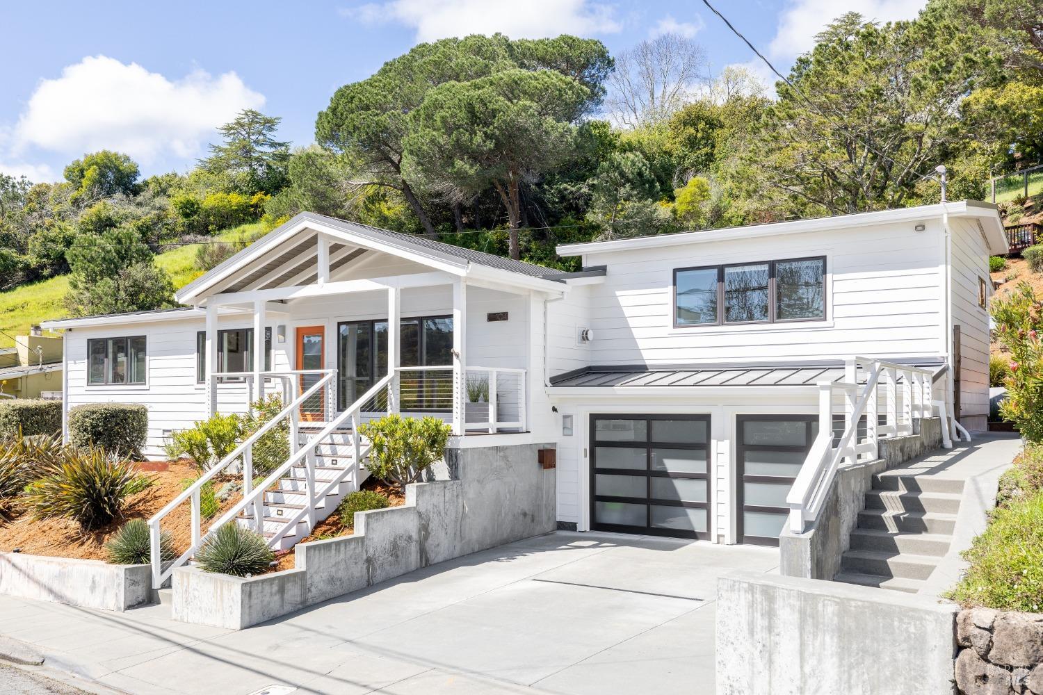 104 Walnut Avenue Corte Madera, CA 94925 - Photo 1 of 1 a front view of a house with potted plants