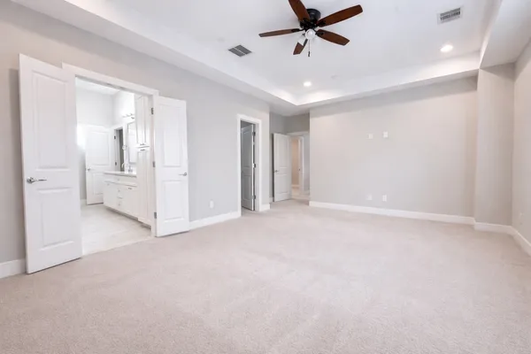 a view of a livingroom with a ceiling fan
