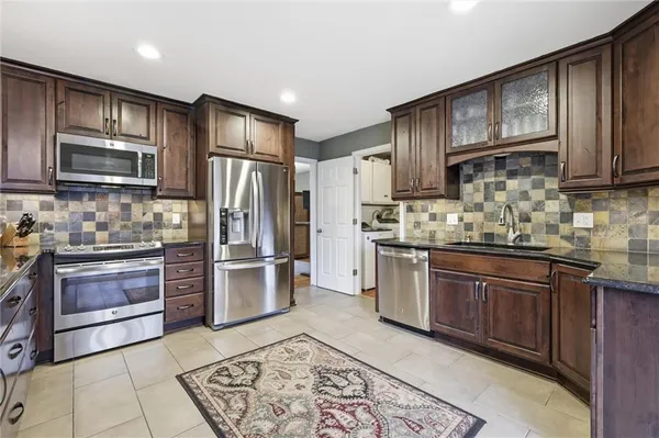 $415,000 | 10718 West 102nd Street, Overland Park, KS 66214