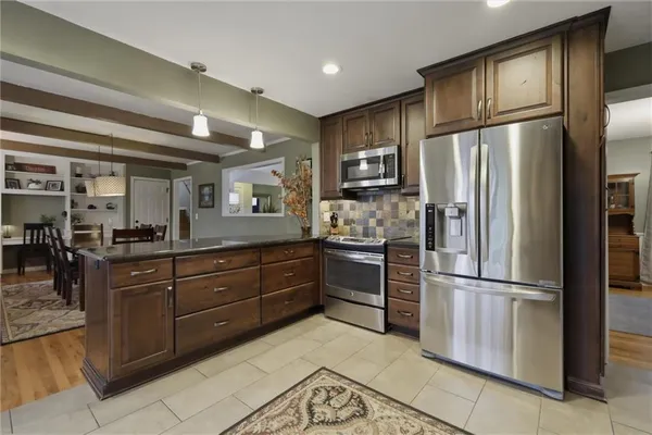 $415,000 | 10718 West 102nd Street, Overland Park, KS 66214