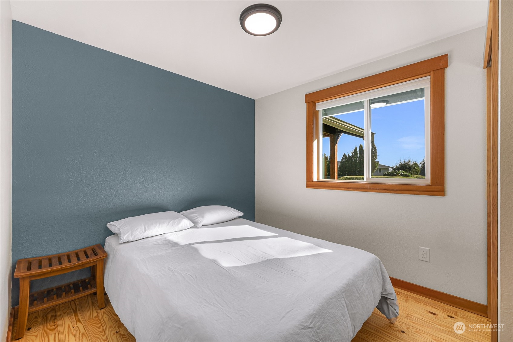 2993 Canlin Drive Ferndale, WA 98248 - Photo 21 of 35 a bedroom with a bed and a window