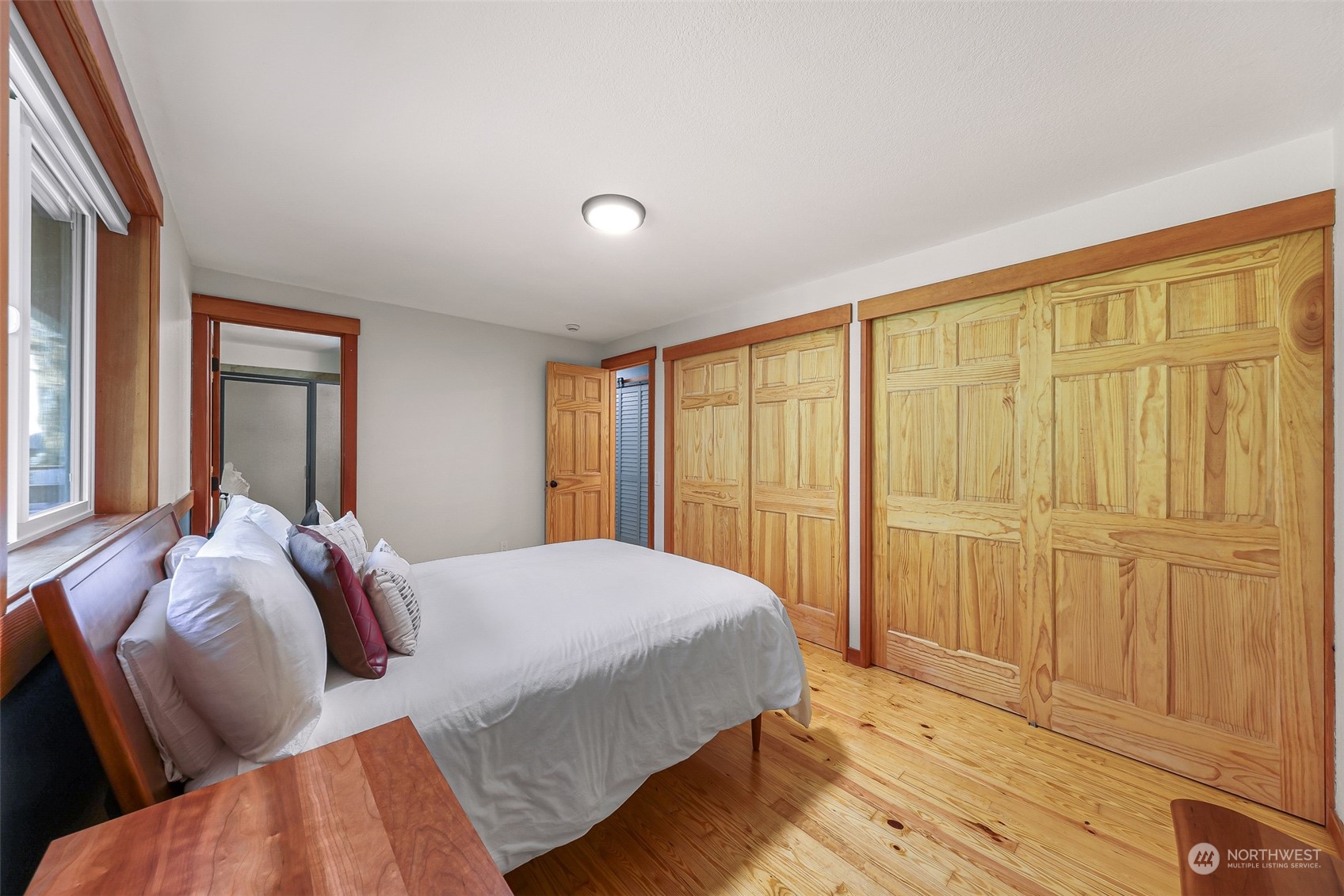 2993 Canlin Drive Ferndale, WA 98248 - Photo 24 of 35 a bedroom with a bed and a window