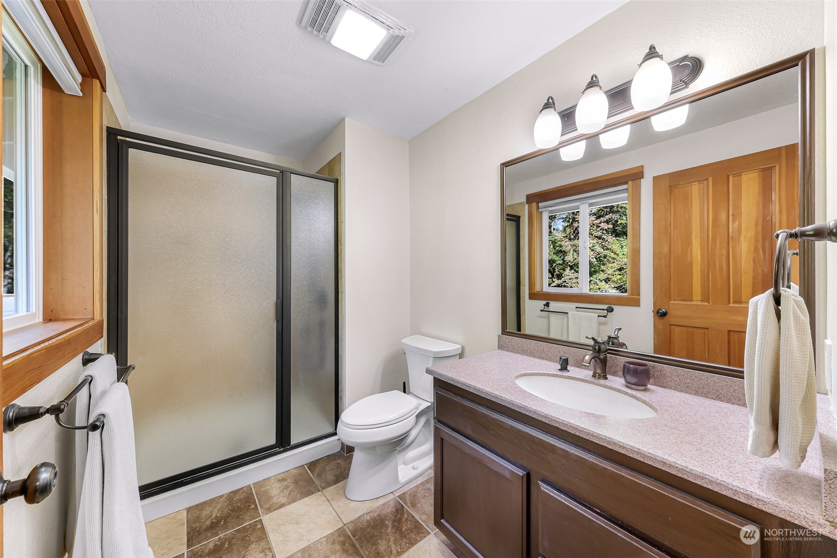 2993 Canlin Drive Ferndale, WA 98248 - Photo 25 of 35 a bathroom with a granite countertop sink toilet and shower