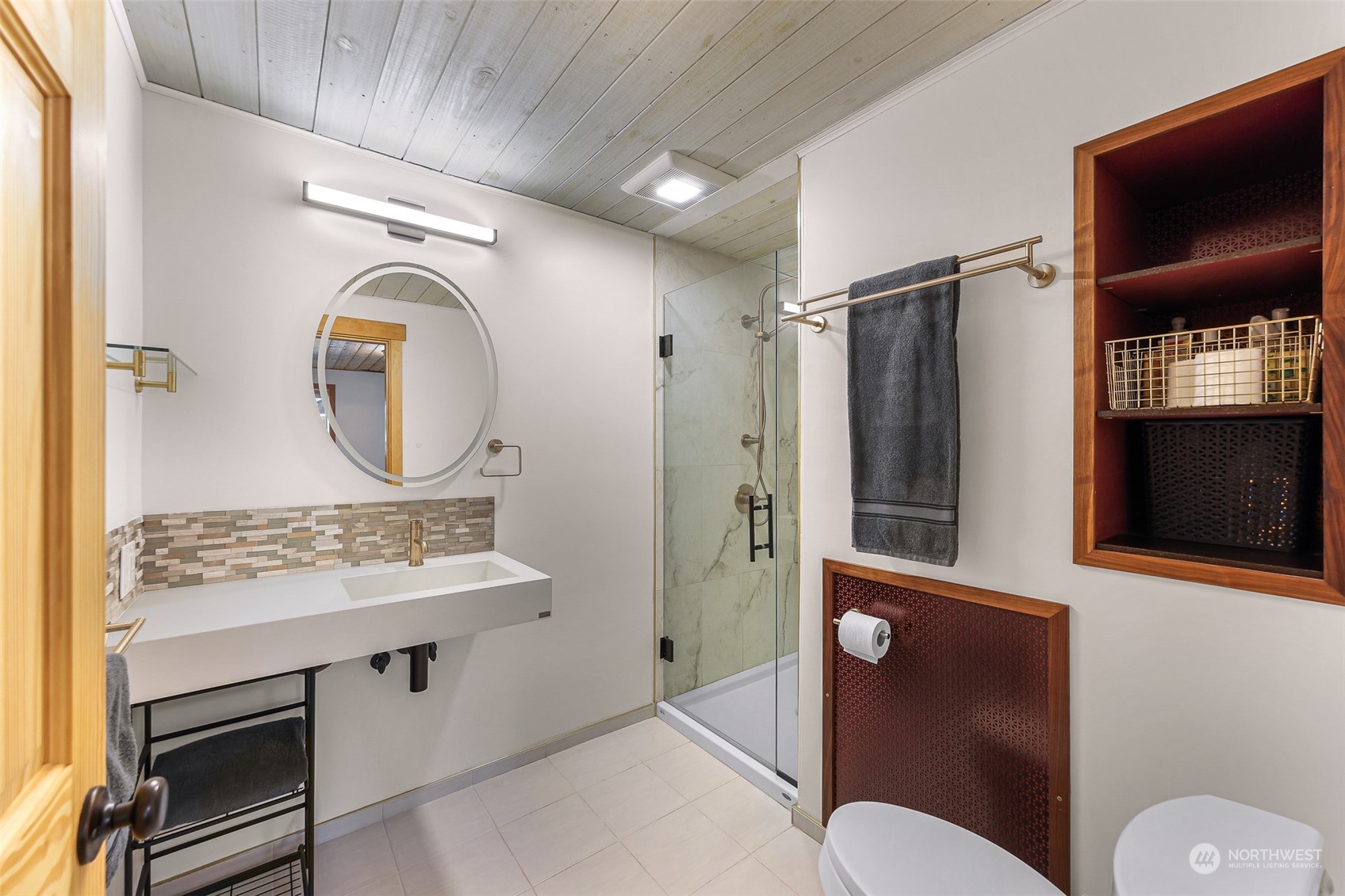 2993 Canlin Drive Ferndale, WA 98248 - Photo 31 of 35 a bathroom with a toilet a sink and a mirror