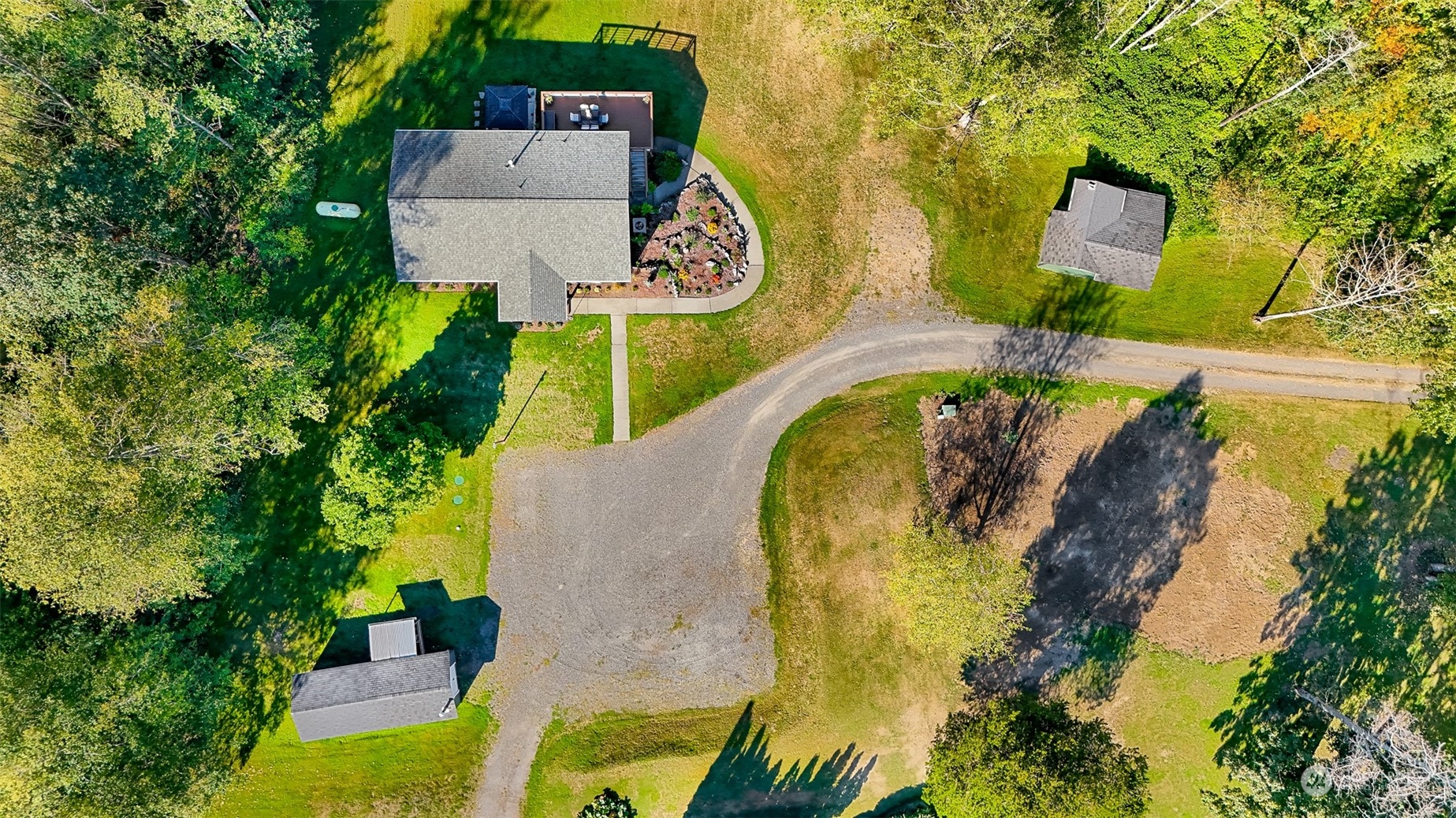 2993 Canlin Drive Ferndale, WA 98248 - Photo 34 of 35 an aerial view of a house with a swimming pool