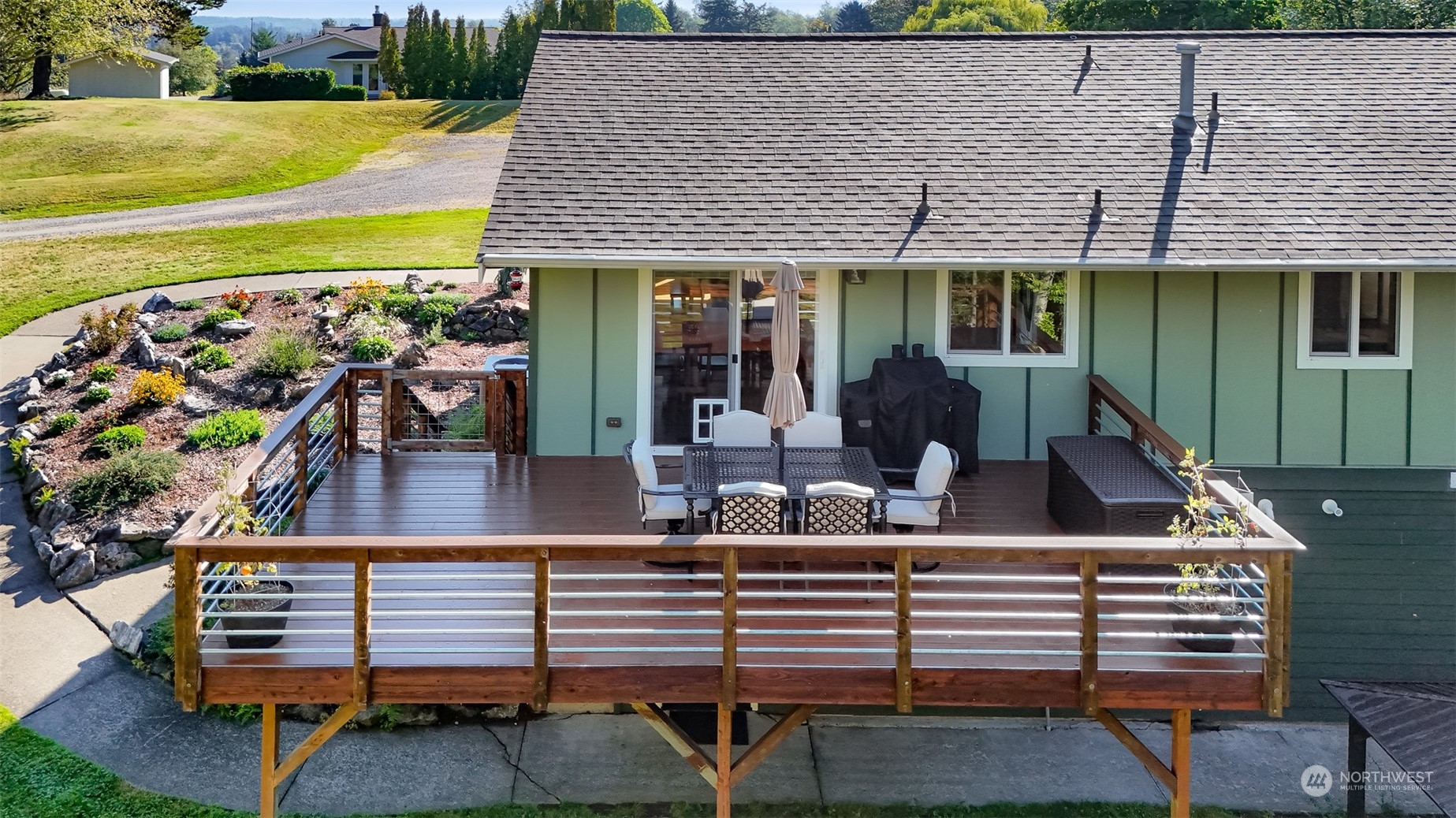 2993 Canlin Drive Ferndale, WA 98248 - Photo 4 of 35 a front view of a house with garden