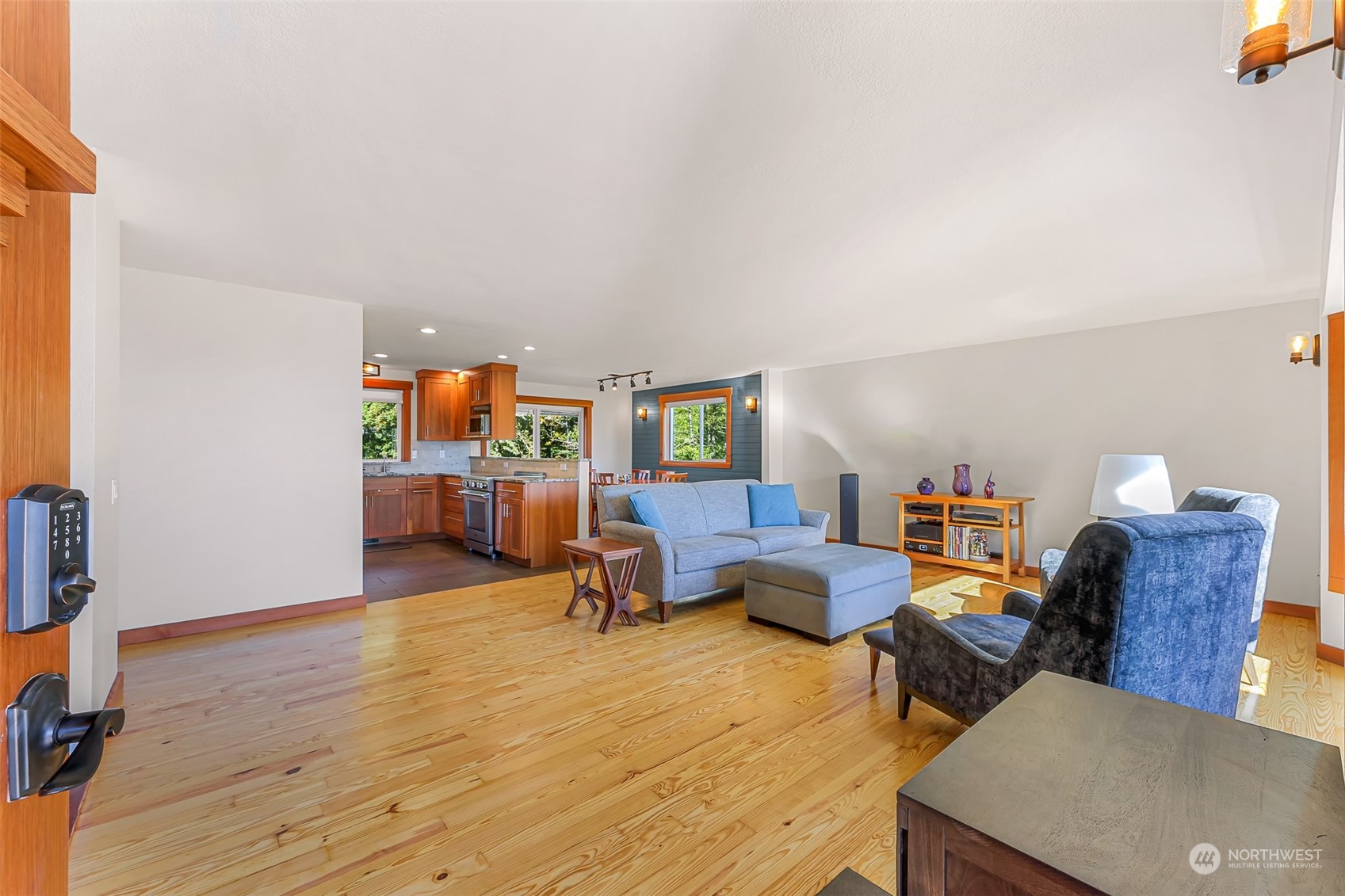 2993 Canlin Drive Ferndale, WA 98248 - Photo 6 of 35 a living room with furniture and a wooden floor