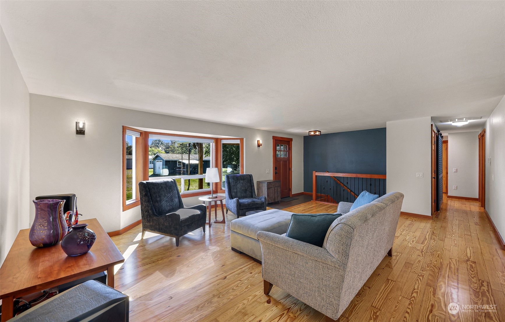 2993 Canlin Drive Ferndale, WA 98248 - Photo 9 of 35 a living room with furniture and a wooden floor