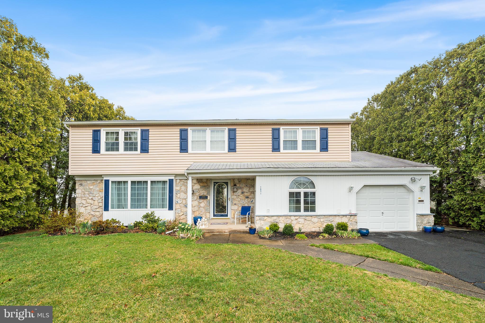 front view of house with a yard