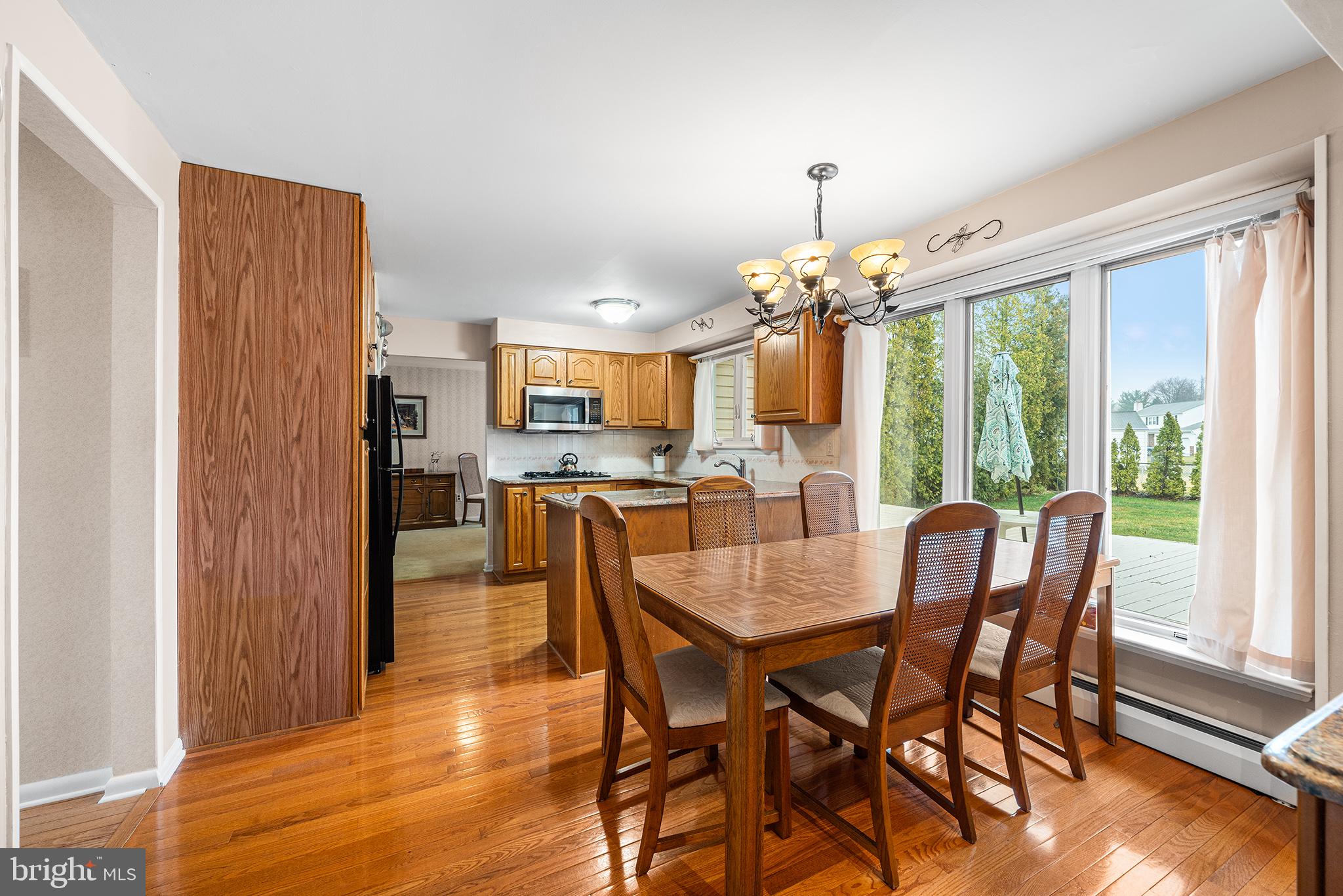 1571 Carousel Drive Warminster, PA 18974 - Photo 15 of 40 a dining room with furniture window and wooden floor