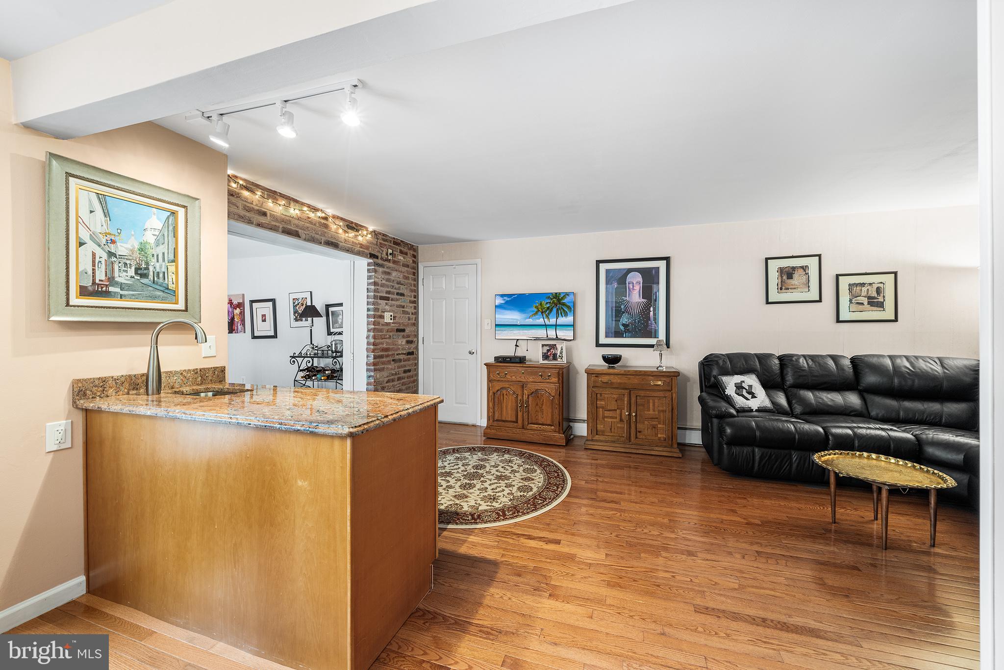 1571 Carousel Drive Warminster, PA 18974 - Photo 16 of 40 a living room with furniture and a table