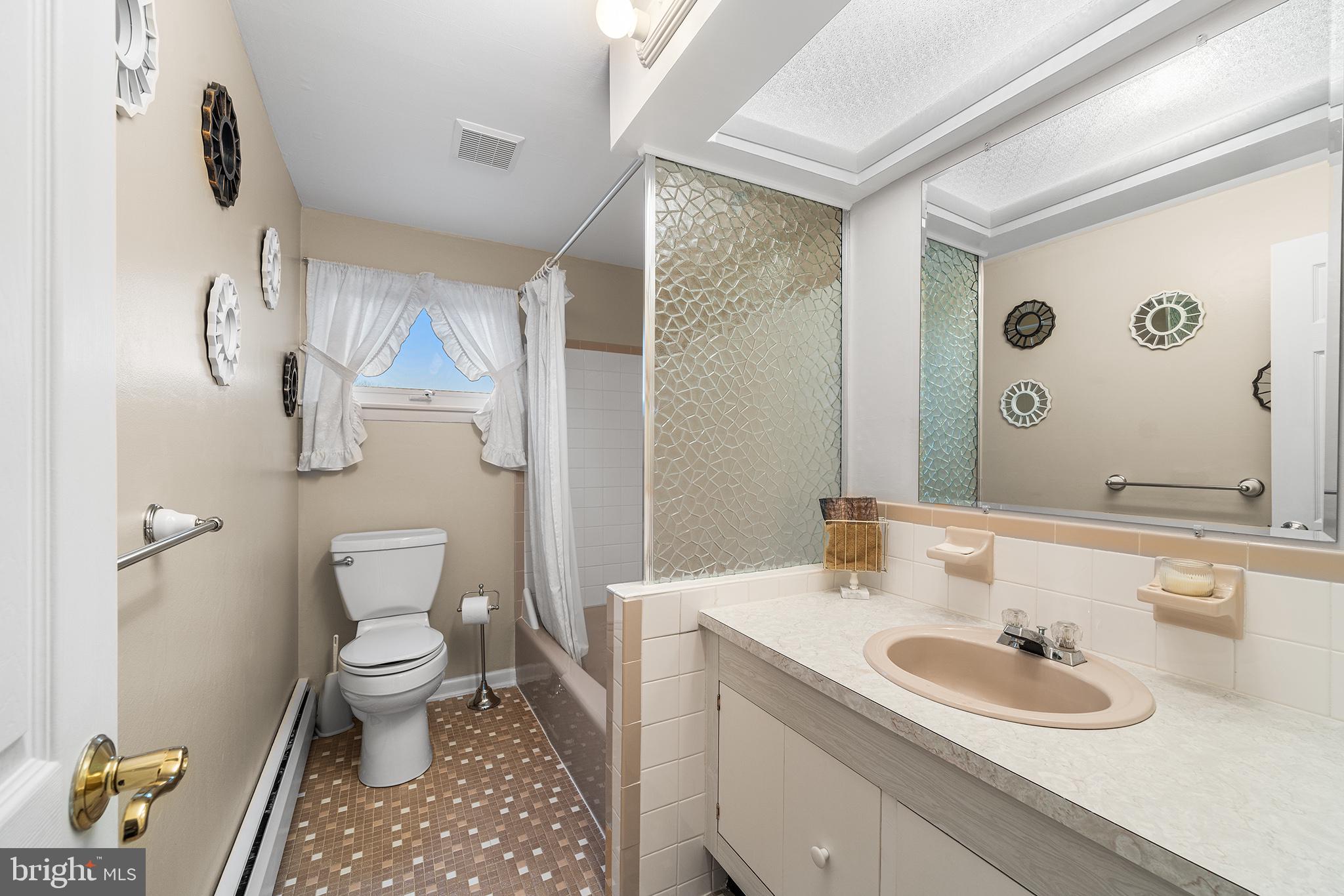 1571 Carousel Drive Warminster, PA 18974 - Photo 27 of 40 a bathroom with a sink toilet and shower