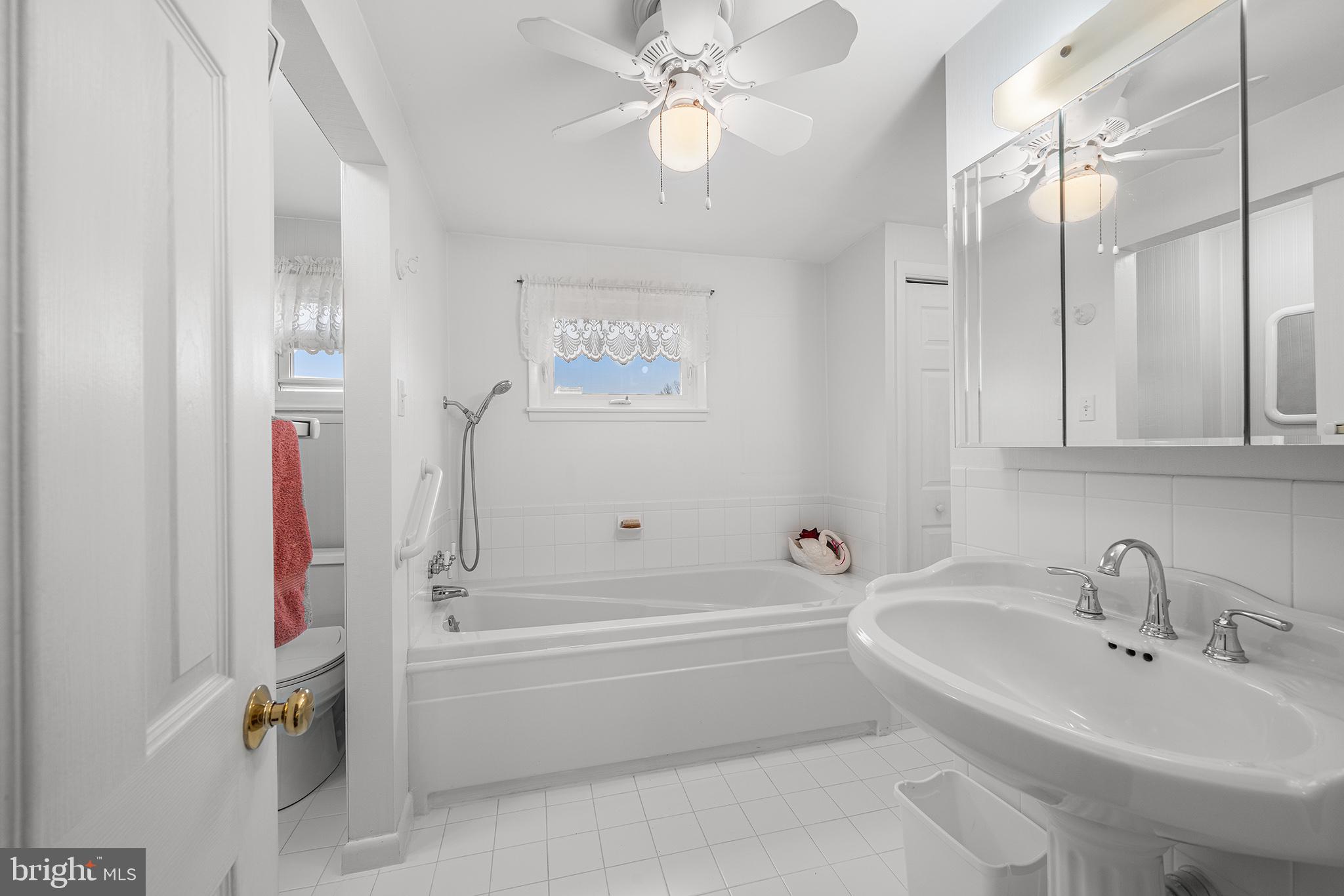 1571 Carousel Drive Warminster, PA 18974 - Photo 31 of 40 a bathroom with a bathtub and a sink