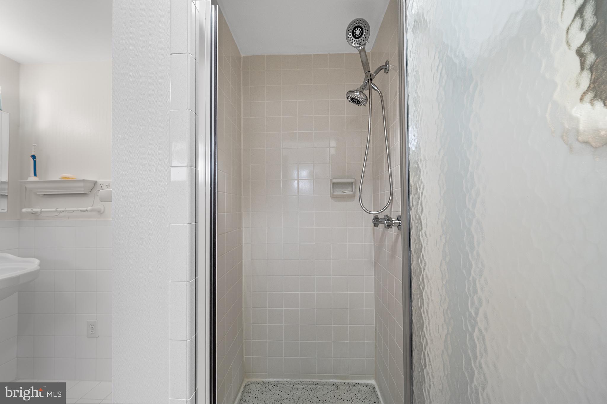 1571 Carousel Drive Warminster, PA 18974 - Photo 32 of 40 a bathroom with a granite countertop shower