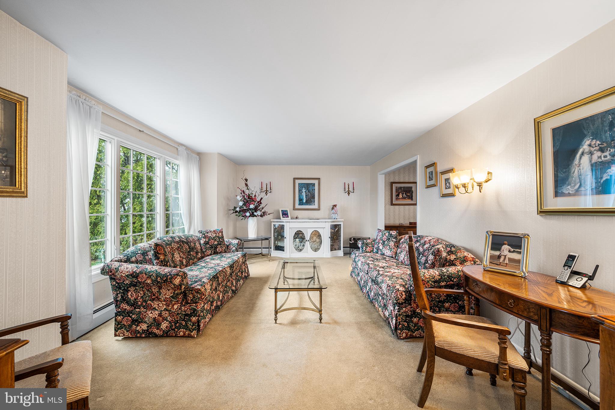 1571 Carousel Drive Warminster, PA 18974 - Photo 5 of 40 a living room with furniture and a large window