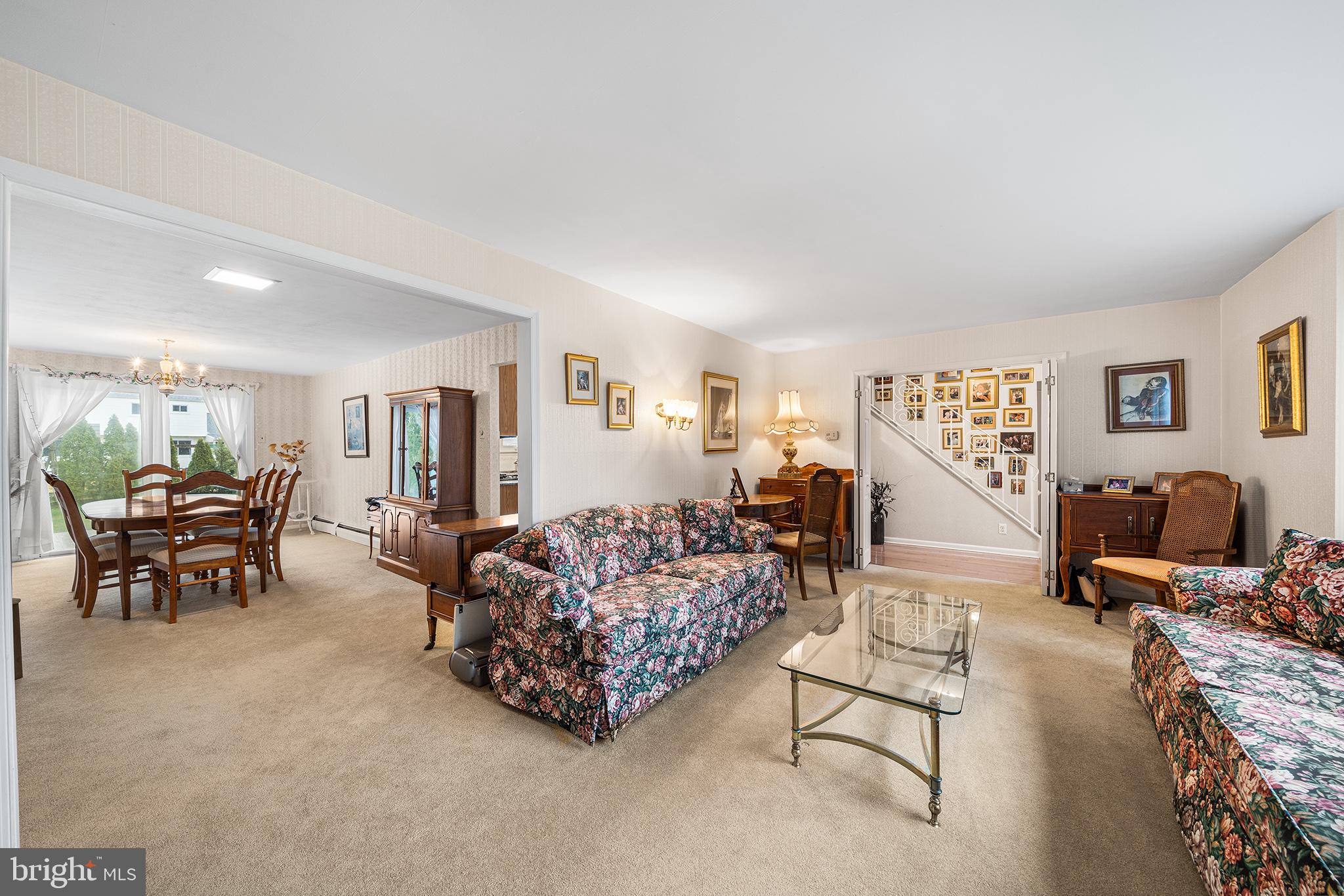 1571 Carousel Drive Warminster, PA 18974 - Photo 6 of 40 a living room with furniture and a table