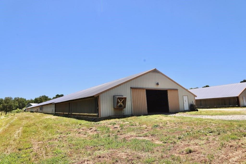 1600 Will Evans Road Chatsworth, GA 30705 - Photo 29 of 79 a front view of a house with a yard