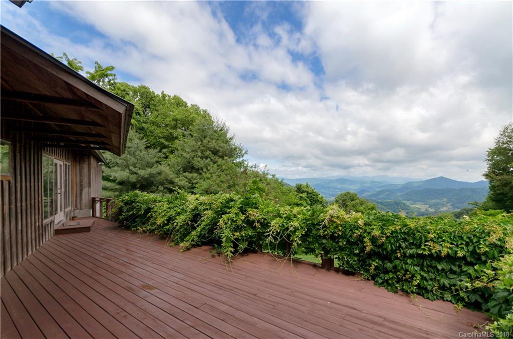 670 Run Away Ridge Clyde, NC 28721 - Photo 22 of 24 a view of a backyard of the house