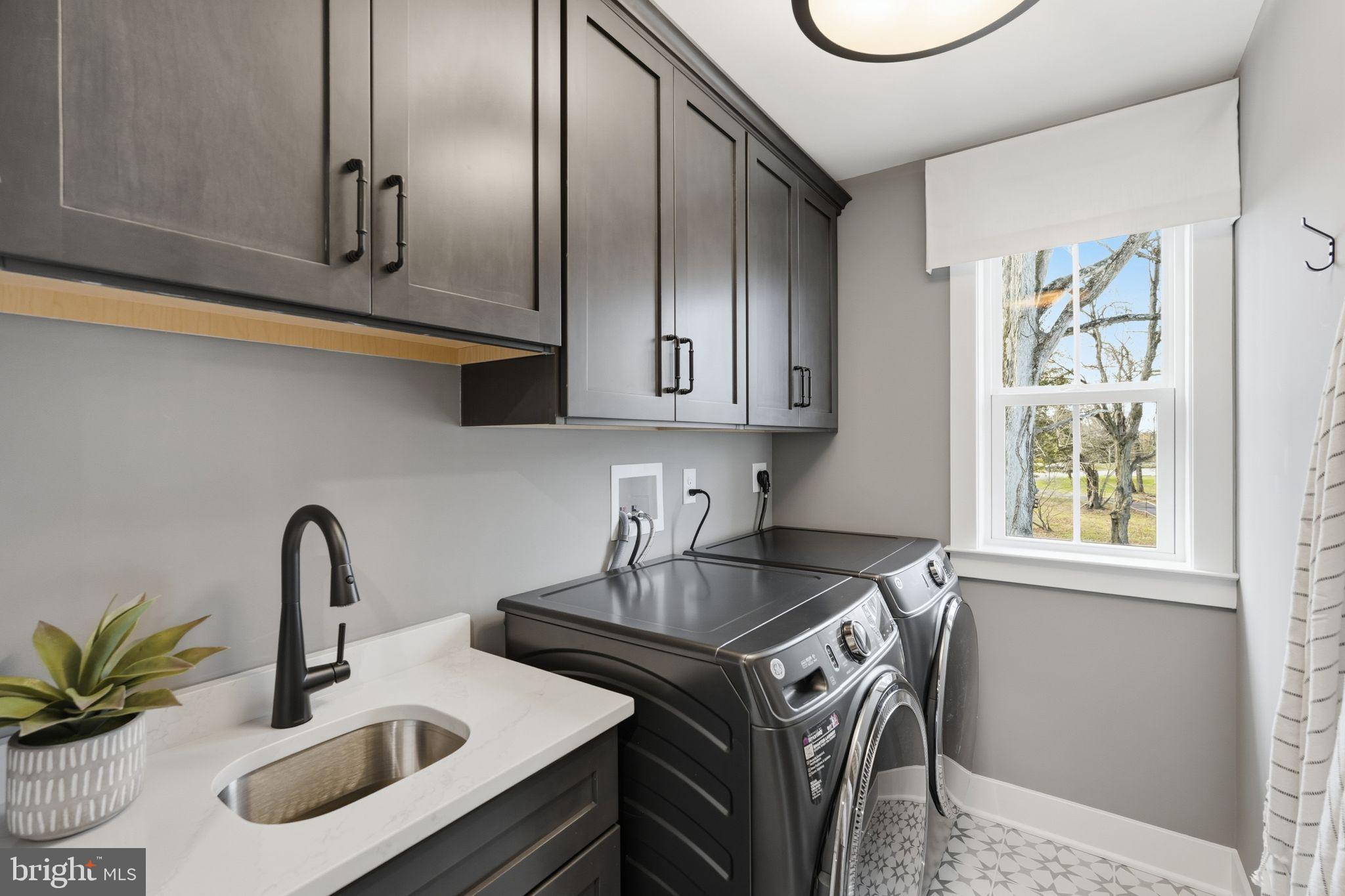 404 Pennybrook Court, Unit 15 Flourtown, PA 19031 - Photo 22 of 31 a kitchen with stainless steel appliances granite countertop a sink and cabinets