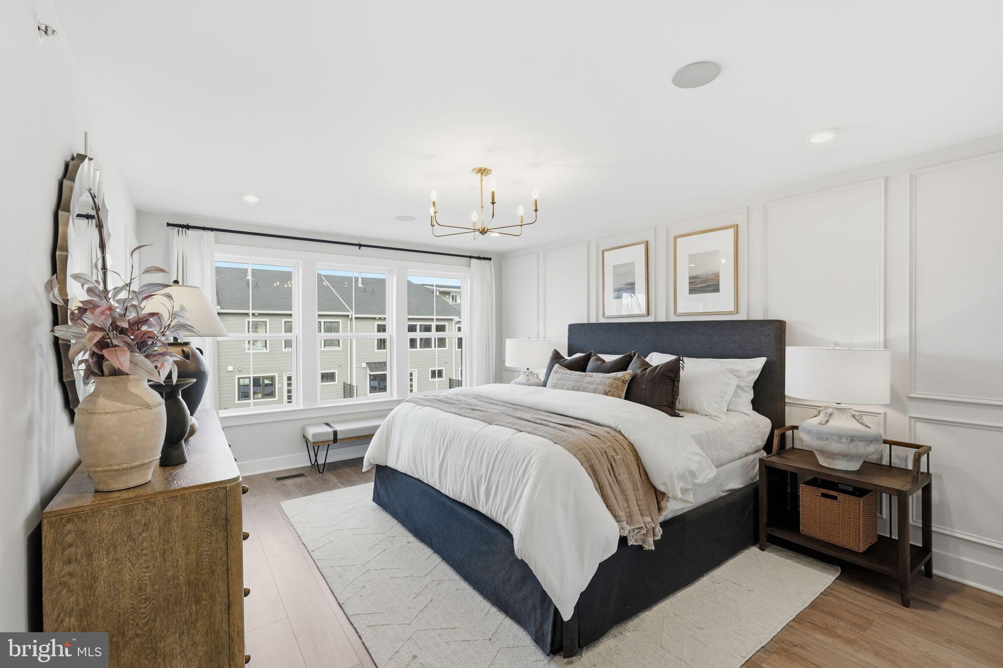 404 Pennybrook Court, Unit 15 Flourtown, PA 19031 - Photo 23 of 31 a spacious bedroom with a bed and a couch