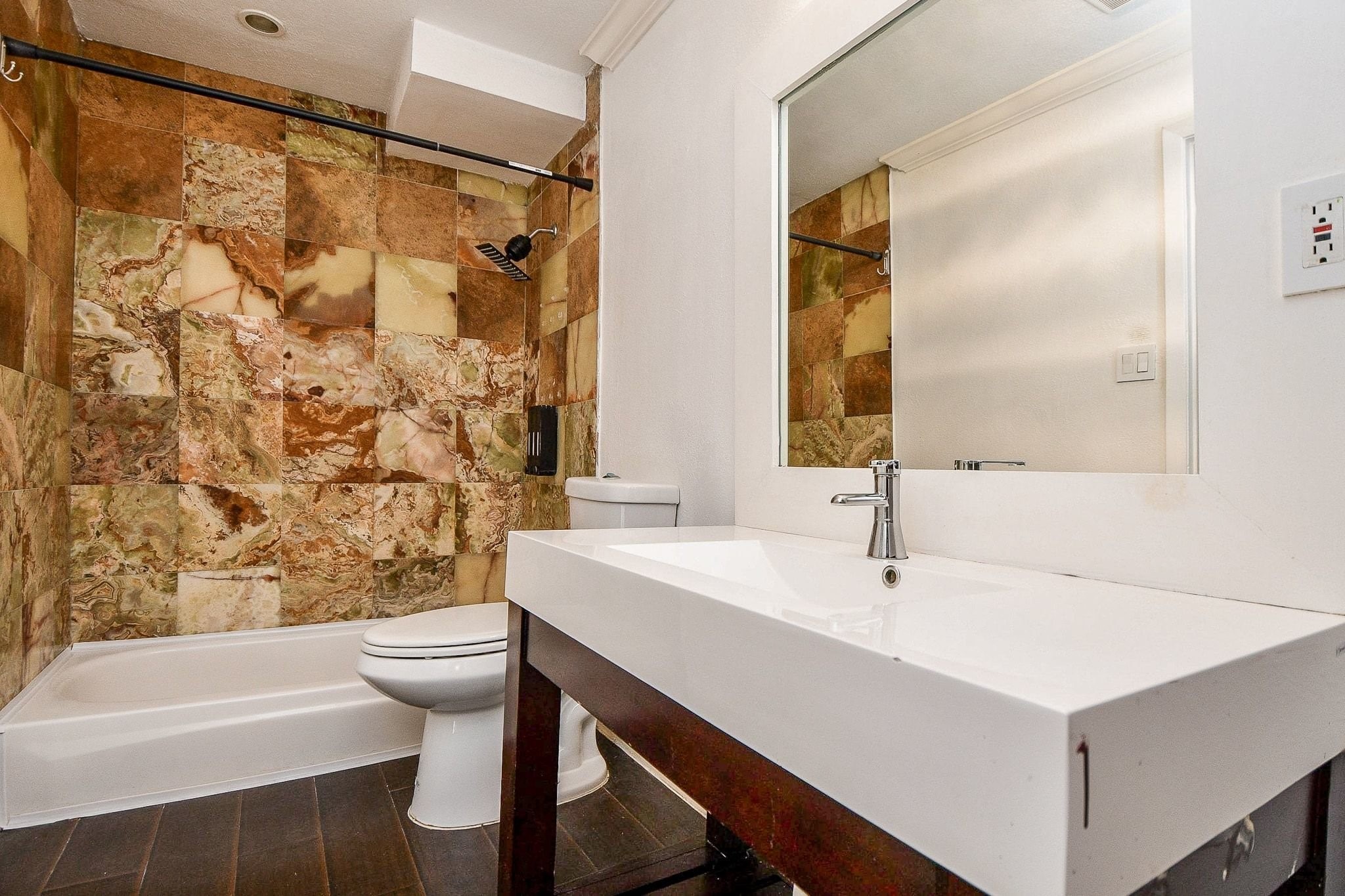 6000 Inwood Drive, Unit 1 Houston, TX 77057 - Photo 9 of 29 a bathroom with a sink and a mirror