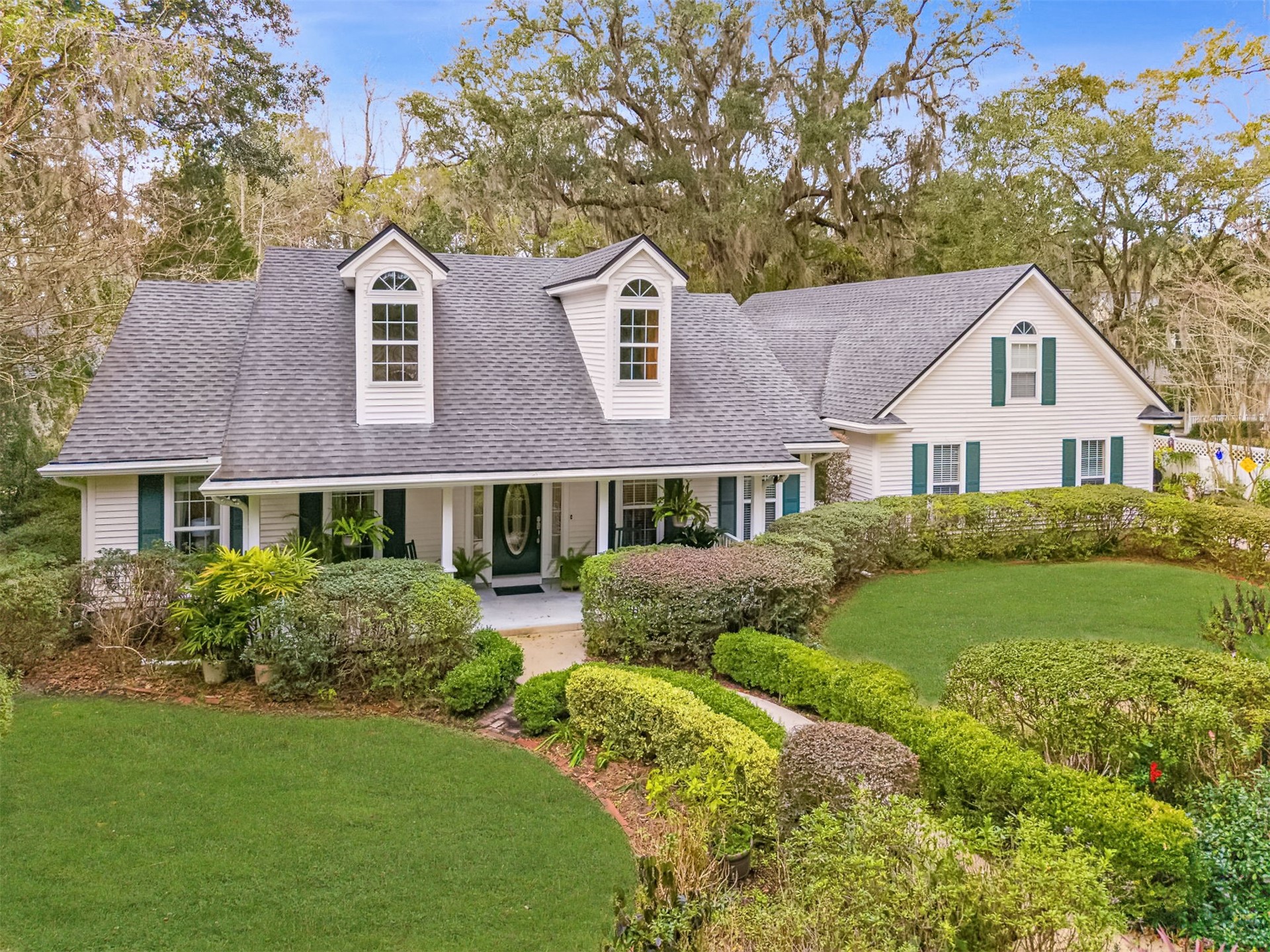 86341 Meadowfield Bluffs Road Yulee, FL 32097 - Photo 1 of 68 a front view of a house with a yard and garage