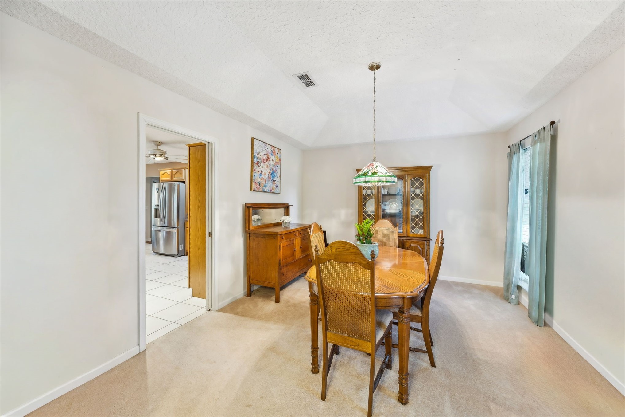 86341 Meadowfield Bluffs Road Yulee, FL 32097 - Photo 15 of 68 a dining room with furniture and window