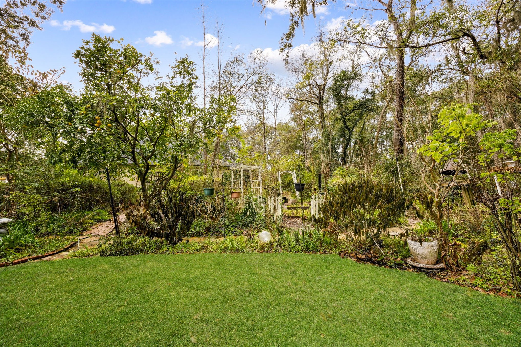 86341 Meadowfield Bluffs Road Yulee, FL 32097 - Photo 42 of 68 a view of an outdoor space and a yard