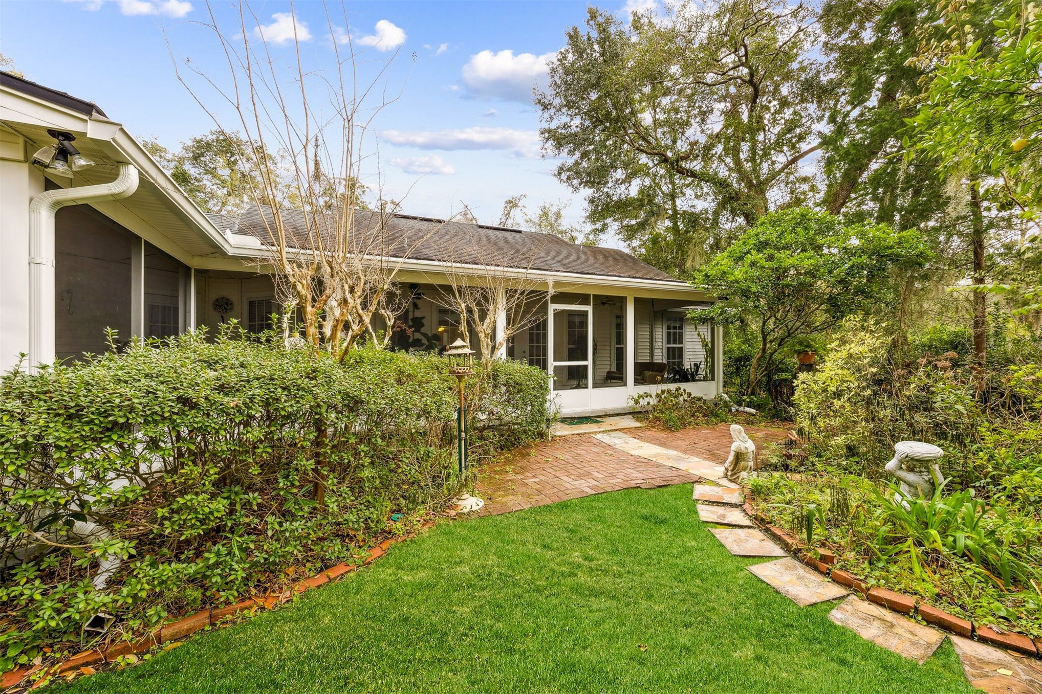 86341 Meadowfield Bluffs Road Yulee, FL 32097 - Photo 45 of 68 front view of a house with a yard