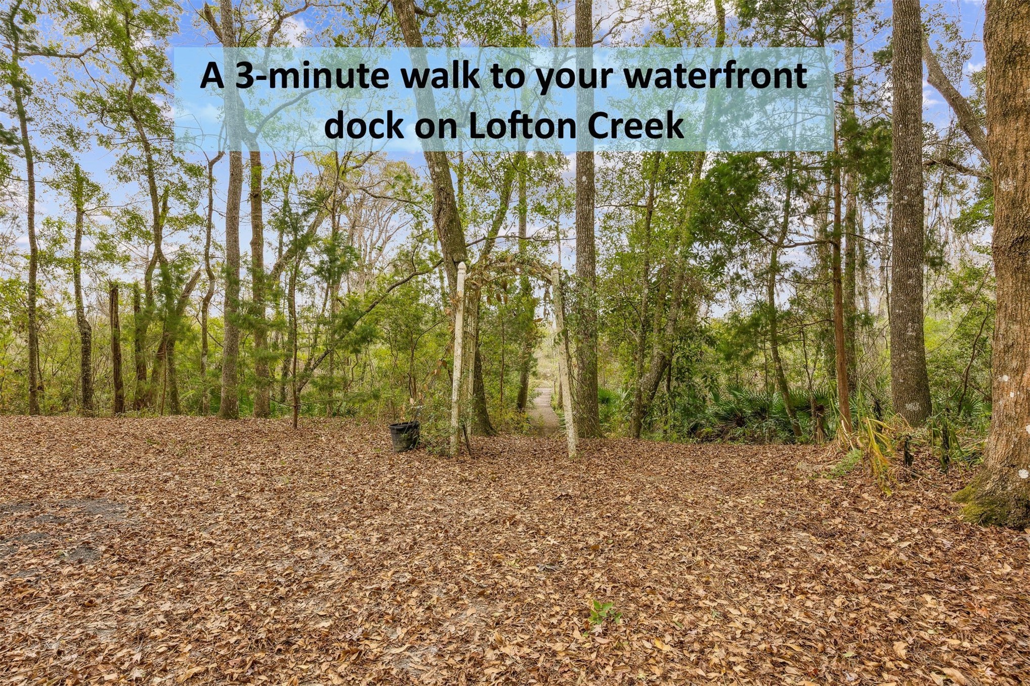 86341 Meadowfield Bluffs Road Yulee, FL 32097 - Photo 49 of 68 a view of outdoor space with signage and flags