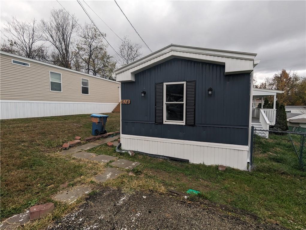 a house with trees in the background