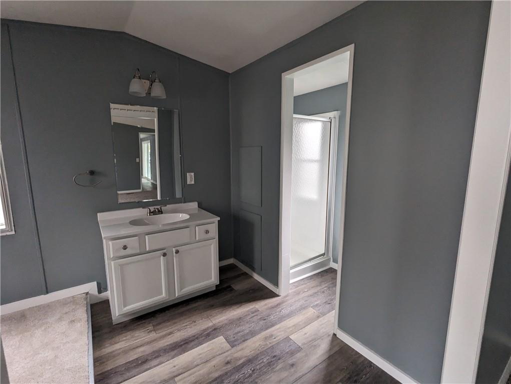 514 Reed Circle Ruffs Dale, PA 15679 - Photo 17 of 19 a bathroom with a sink and a mirror