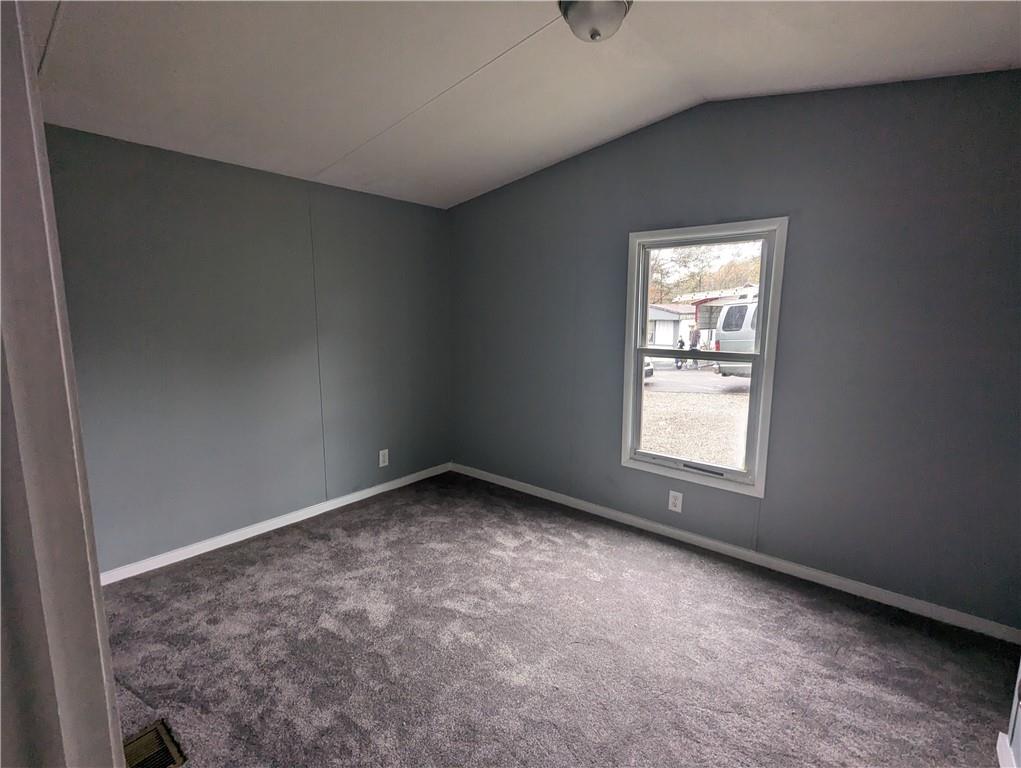 514 Reed Circle Ruffs Dale, PA 15679 - Photo 8 of 19 an empty room with a window